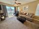 Living room with patio access and comfortable seating at 636 Waterway Village Blvd. # 17C, Myrtle Beach, SC 29579