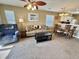 Cozy living room features a comfy sofa, armchair, and dining area at 636 Waterway Village Blvd. # 17C, Myrtle Beach, SC 29579