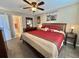 Spacious main bedroom with a king-size bed and ensuite bathroom at 636 Waterway Village Blvd. # 17C, Myrtle Beach, SC 29579