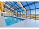 Indoor heated pool with large windows and skylights at 6900 N Ocean Blvd. # 838, Myrtle Beach, SC 29572