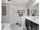 Bathroom features a double vanity, walk-in shower, and a relaxing soaking tub at 834 Arezzo Way # 834, Myrtle Beach, SC 29579