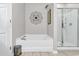 Relaxing bathroom with a large soaking tub and a separate walk-in shower at 834 Arezzo Way # 834, Myrtle Beach, SC 29579