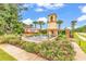 Community entrance with Tuscan-style architecture and fountain at 834 Arezzo Way # 834, Myrtle Beach, SC 29579