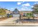 Attractive exterior of a two-story house with a two-car garage and well-manicured landscaping at 834 Arezzo Way # 834, Myrtle Beach, SC 29579