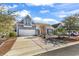 Two-story home with gray siding and a two-car garage at 834 Arezzo Way # 834, Myrtle Beach, SC 29579