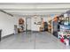Attached garage with ample storage shelving and flooring at 834 Arezzo Way # 834, Myrtle Beach, SC 29579