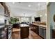 Open kitchen boasts stainless steel appliances and an island at 834 Arezzo Way # 834, Myrtle Beach, SC 29579