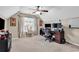 Home office with a large desk, multiple monitors, and ample natural light at 834 Arezzo Way # 834, Myrtle Beach, SC 29579