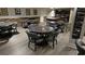 Community recreation room with tables, chairs, and games at 834 Arezzo Way # 834, Myrtle Beach, SC 29579