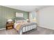 Nautical-themed bedroom with a metal bed frame and green wallpaper at 839 Buttonwood Dr., Conway, SC 29527