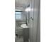 Bathroom with a sink, tub, and shower at 923 N Waccamaw Dr., Garden City Beach, SC 29576