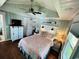 Charming bedroom with a coastal theme and hardwood floors at 923 N Waccamaw Dr., Garden City Beach, SC 29576