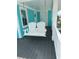Relaxing deck with a porch swing at 923 N Waccamaw Dr., Garden City Beach, SC 29576
