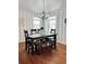 Dining area with rustic table and kitchen view at 923 N Waccamaw Dr., Garden City Beach, SC 29576
