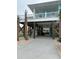 Elevated home with parking underneath at 923 N Waccamaw Dr., Garden City Beach, SC 29576