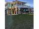 Elevated beach home with a large deck and ocean views at 923 N Waccamaw Dr., Garden City Beach, SC 29576