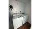 Laundry room with washer and dryer included at 923 N Waccamaw Dr., Garden City Beach, SC 29576