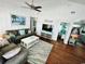 Living area with hardwood floors and coastal decor at 923 N Waccamaw Dr., Garden City Beach, SC 29576