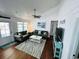 Bright living room with comfy seating, hardwood floors, and a beachy vibe at 923 N Waccamaw Dr., Garden City Beach, SC 29576