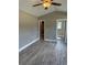 Bedroom with wood-look floors, a closet, and a window at Tbb14 Casey Dr., Green Sea, SC 29545