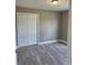 Bedroom with double door closet and vinyl plank flooring at Tbb14 Casey Dr., Green Sea, SC 29545