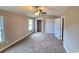 Well-lit bedroom featuring carpet, a closet, and a window at Tbb14 Casey Dr., Green Sea, SC 29545