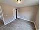 Bright bedroom featuring vinyl plank flooring and a double door closet at Tbb14 Casey Dr., Green Sea, SC 29545