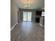 Bright dining room featuring hardwood floors and sliding glass doors at Tbb14 Casey Dr., Green Sea, SC 29545