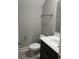 Clean bathroom with dark vanity and white toilet at Tbd 13 Casey Dr., Green Sea, SC 29545