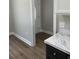 Bright entryway with vinyl plank flooring and view of kitchen at Tbd 13 Casey Dr., Green Sea, SC 29545