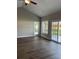 Living room with hardwood floors, doors to backyard, and ceiling fan at Tbd 13 Casey Dr., Green Sea, SC 29545