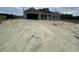 Newly constructed home with a gray exterior and a two-car garage at Tbd 14 Casey Dr., Green Sea, SC 29545