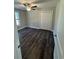 Spacious bedroom with dark vinyl flooring and double door closet at Tbd10 Casey Dr., Green Sea, SC 29545