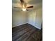 Well-lit bedroom featuring dark vinyl flooring and a large closet at Tbd10 Casey Dr., Green Sea, SC 29545