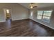 Open living room with hardwood floors and access to other rooms at Tbd10 Casey Dr., Green Sea, SC 29545