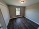 Spacious bedroom with dark gray flooring and double doors at Tbd11 Casey Dr., Green Sea, SC 29545