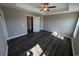 Bedroom with dark laminate floors and ceiling fan at Tbd11 Casey Dr., Green Sea, SC 29545