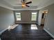 Main bedroom with dark laminate flooring and ceiling fan at Tbd11 Casey Dr., Green Sea, SC 29545