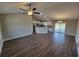 Open living space with hardwood floors, kitchen island, and access to backyard at Tbd9 Casey Dr., Green Sea, SC 29545