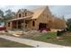 Exterior view of a home under construction showing the framing of the two-car garage at 1004 James Island Ave., North Myrtle Beach, SC 29582