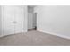 Spacious bedroom features plush carpeting, double closets, and access to the rest of the house at 1099 Nw Forest Bend Dr., Calabash, NC 28467