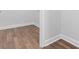 Close up on hallway, showcasing rich hardwood floors and clean, white trim at 1099 Nw Forest Bend Dr., Calabash, NC 28467