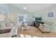 Bright living room featuring comfy seating and a sunroom at 1107 Ganton Way, Myrtle Beach, SC 29588