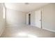 Bright bedroom with gray walls, carpet, and a closet at 117 George Washington Trail, Georgetown, SC 29440