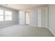 Simple bedroom with carpet, a closet and bathroom access at 117 George Washington Trail, Georgetown, SC 29440