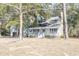 House exterior, showcasing a front porch and yard at 117 George Washington Trail, Georgetown, SC 29440