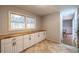 Kitchen with white cabinets and butcher block countertop at 117 George Washington Trail, Georgetown, SC 29440