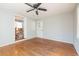 Bright living room featuring hardwood floors and view to dining area at 117 George Washington Trail, Georgetown, SC 29440