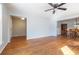 Spacious living room with hardwood floors and access to dining area at 117 George Washington Trail, Georgetown, SC 29440
