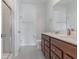 Bathroom with dual sink vanity, and walk-in shower, with modern fixtures and tile flooring at 1336 Winding Creek Way, Myrtle Beach, SC 29588